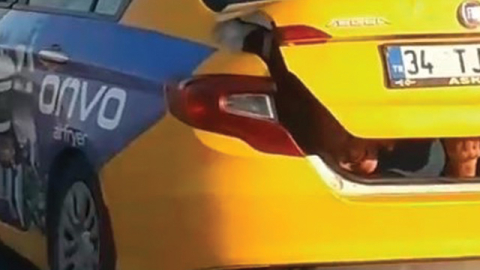 Taksi bagajında seyahat etti