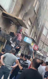 Bursa’da evde çıkan yangında alevlerin arasında kalan kadını mahalleli kurtardı